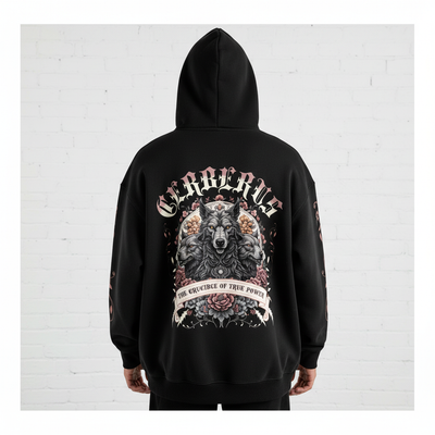 Back view of male model wearing black oversized hoodie