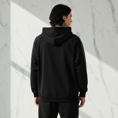 Back view of Shadow Black Contrast Piping Raglan Hoodie on male model