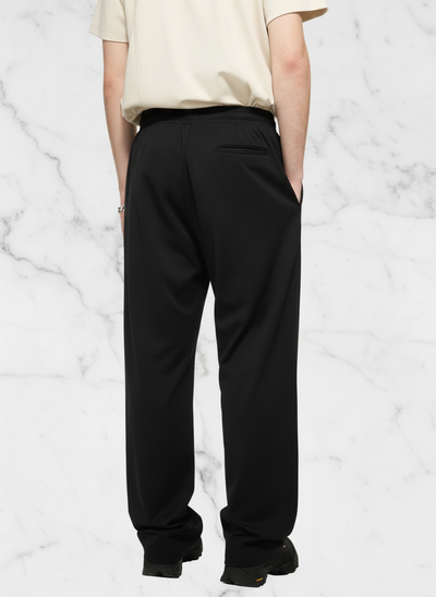 Back view with black pants