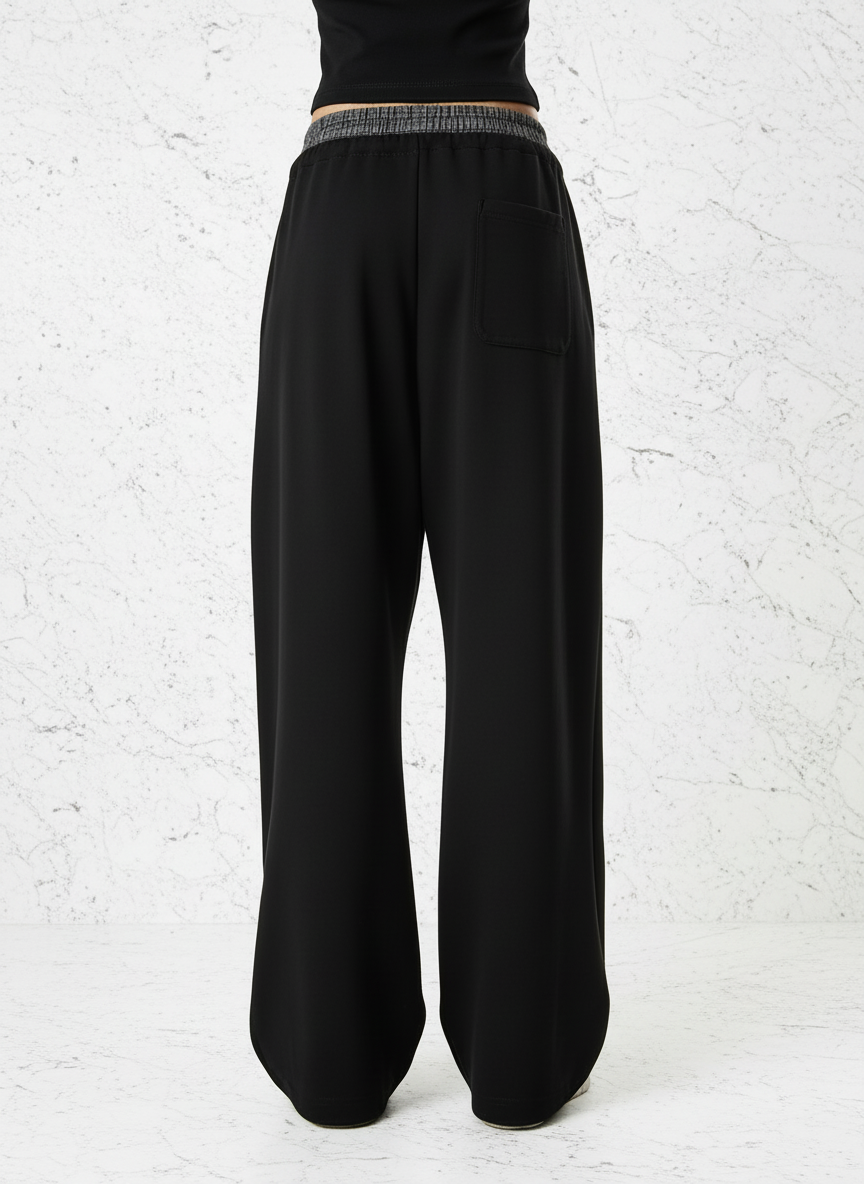 Back view with white stone background