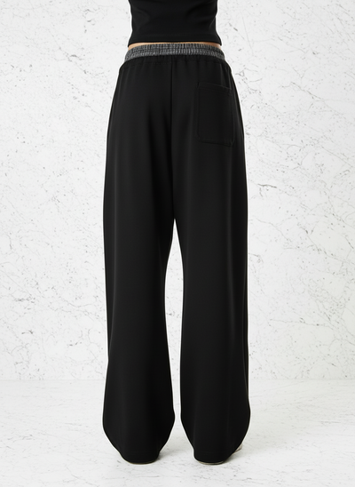 Back view with white stone background