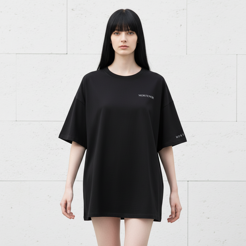 Female model in candid walking pose wearing black t-shirt