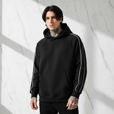 Front view of Shadow Black Contrast Piping Raglan Hoodie on male model