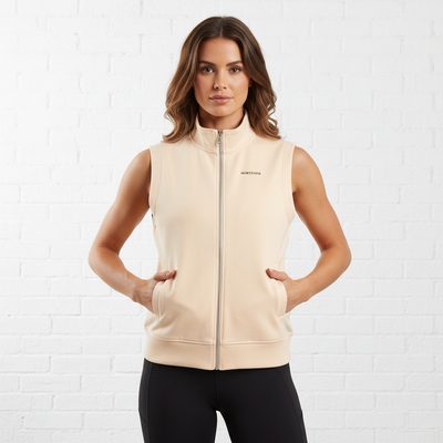 Mild Apricot vest front view with black MORTENOIR text