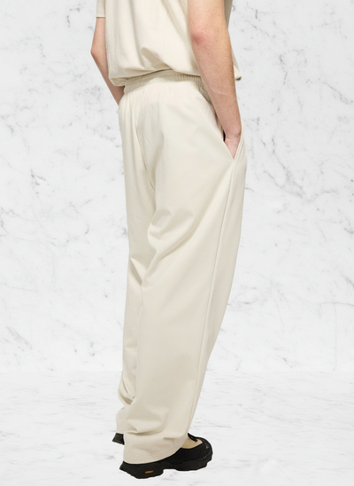 Side view with white stone background